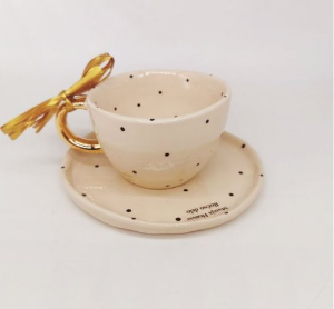 Dotted cup and saucer